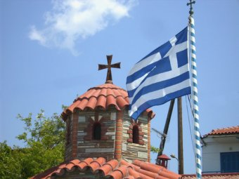 Греция согласилась проводить жесткие реформы в обмен на кредит ЕС и МВФ