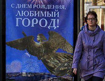 В Петербурге ко Дню города на плакатах появились ангелы с лицом Путина