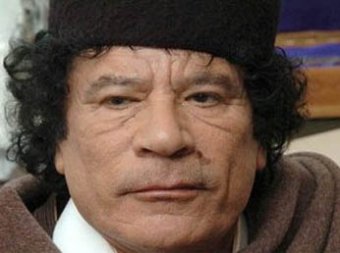 Каддафи и его сына тайно похоронили в ливийской пустыне
