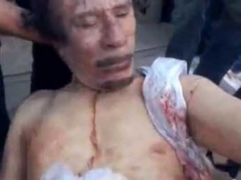 Шок: обнародовано новое видео издевательств повстанцев над телом Каддафи