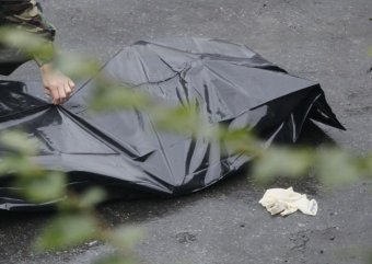 В центре Москвы неизвестные выбросили из машины труп мужчины