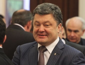 Порошенко принял присягу и обратился к востоку Украины на русском