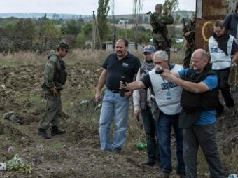 Новости Украины 28 сентября 2014: под Донецком найдено еще одно массовое захоронение