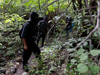 В Мексике нашли тайное захоронение пропавших студентов: их облили бензином и сожгли