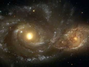 NASA обнародовало уникальное фото слияния двух спиральных галактик