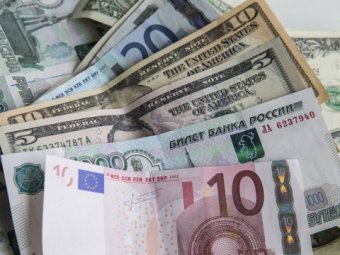 ЦБ повысил курс доллара и понизил курс евро