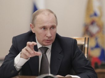 Харьковских учителей могут уволить за фото под портретом Путина
