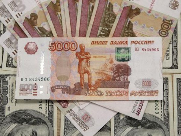Курс доллара 16 сентября 2015 на торгах опустился ниже 66 рублей