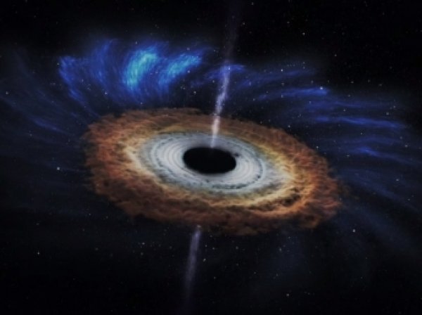 NASA показало поглощение звезды черной дырой