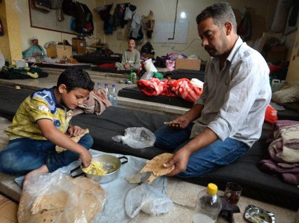 Более 20 американских штатов отказались принимать беженцев из Сирии