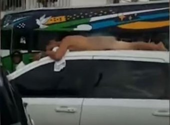 Жена жителя Колумбии возила неверного мужа голым на крыше авто (ВИДЕО)