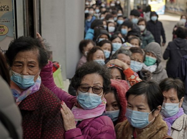 Китайские ученые выяснили, как коронавирус попал на рынок в Ухане