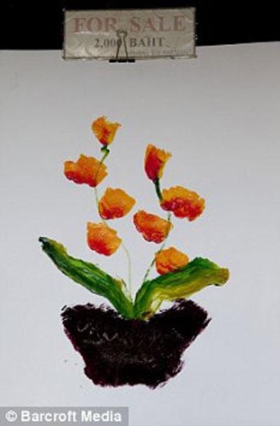 Таиландские слоны поражают мир шедеврами живописи