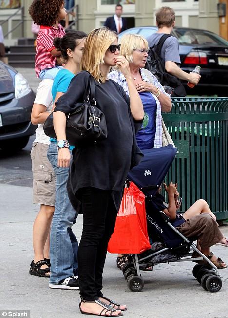 Беременная Хайди Клум  показала животик