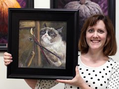 Самый сердитый кот интернета стал музой для художников