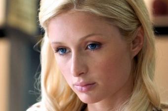 Пэрис Хилтон вышла в свет с шаманом (ФОТО)