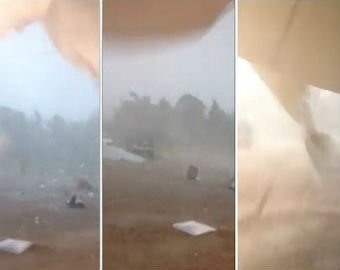 Житель Австралии снял ролик из эпицентра торнадо