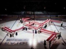 "Югру" встретили в Риге свастикой