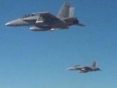 В США испытали сброшенный с истребителей рой беспилотников