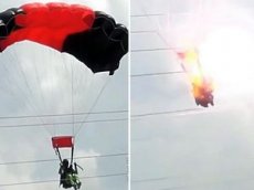 Очевидцы сняли на видео столкновение парашютистки с ЛЭП