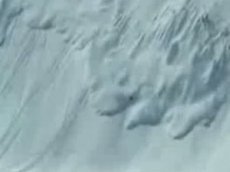 Снегоход вызвал снежную лавину