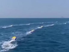 Китай испытал эскадру дронов