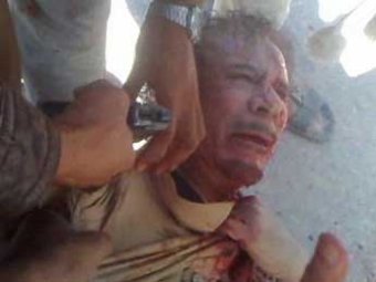 На видео с кадрами убийства Каддафи расслышали русскую речь